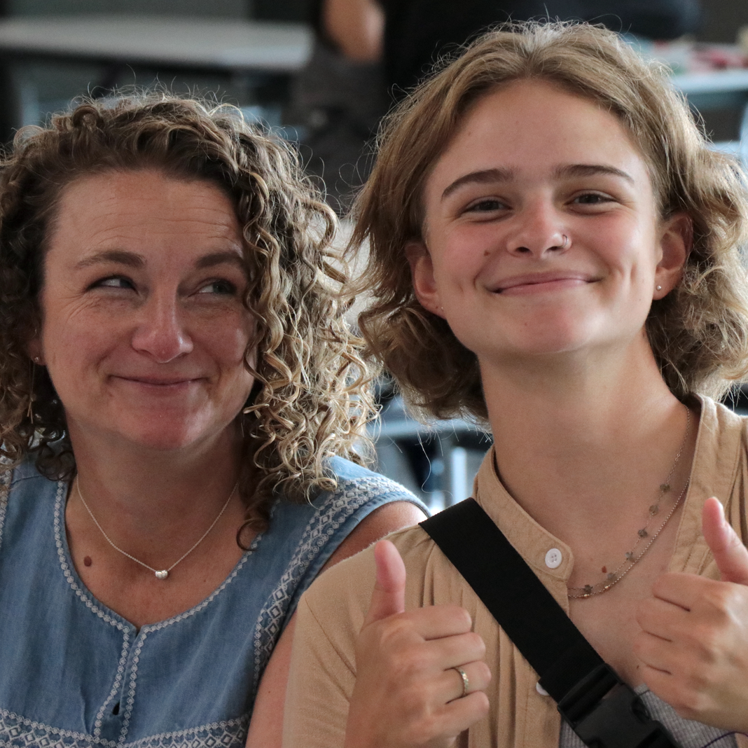  A student gives a thumbs up